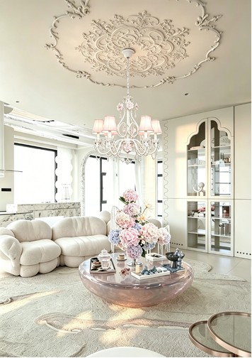 PinkMoire pop-up lounge concept with flowers and a chandelier