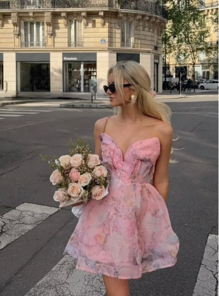 Pink floral dress and bouquet used as a PinkMoire positioning reference